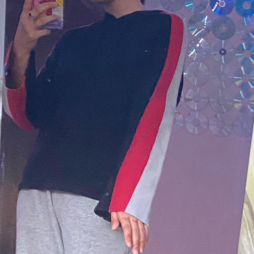 inc top with red and white sleeves